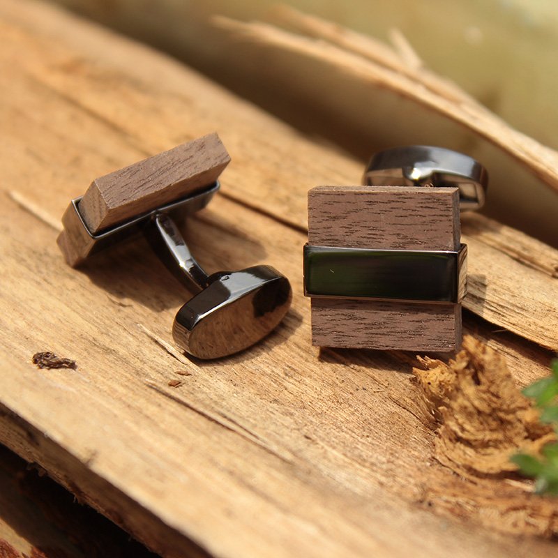 A pair of elegant Wenge Wood Cufflinks made from titanium alloy and wood, displayed in a hard-sided presentation box.