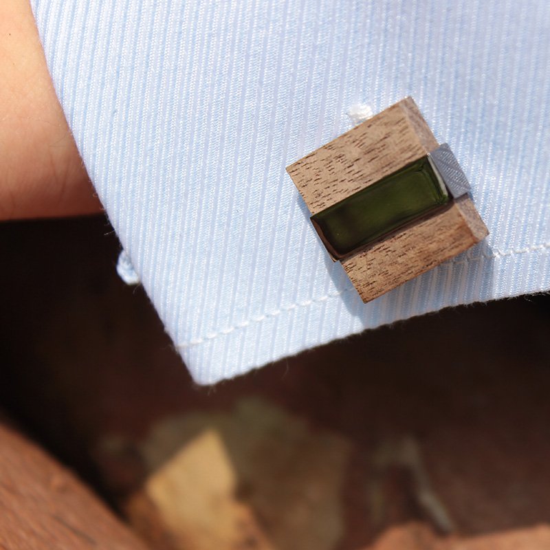 A pair of elegant Wenge Wood Cufflinks made from titanium alloy and wood, displayed in a hard-sided presentation box.