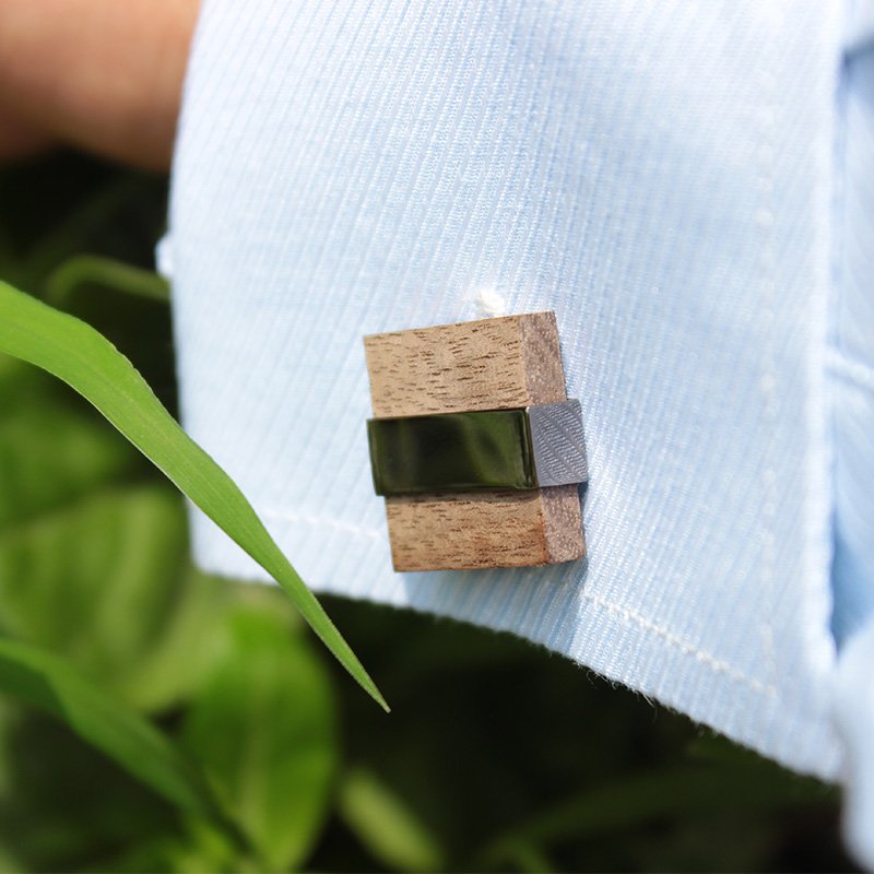 A pair of elegant Wenge Wood Cufflinks made from titanium alloy and wood, displayed in a hard-sided presentation box.