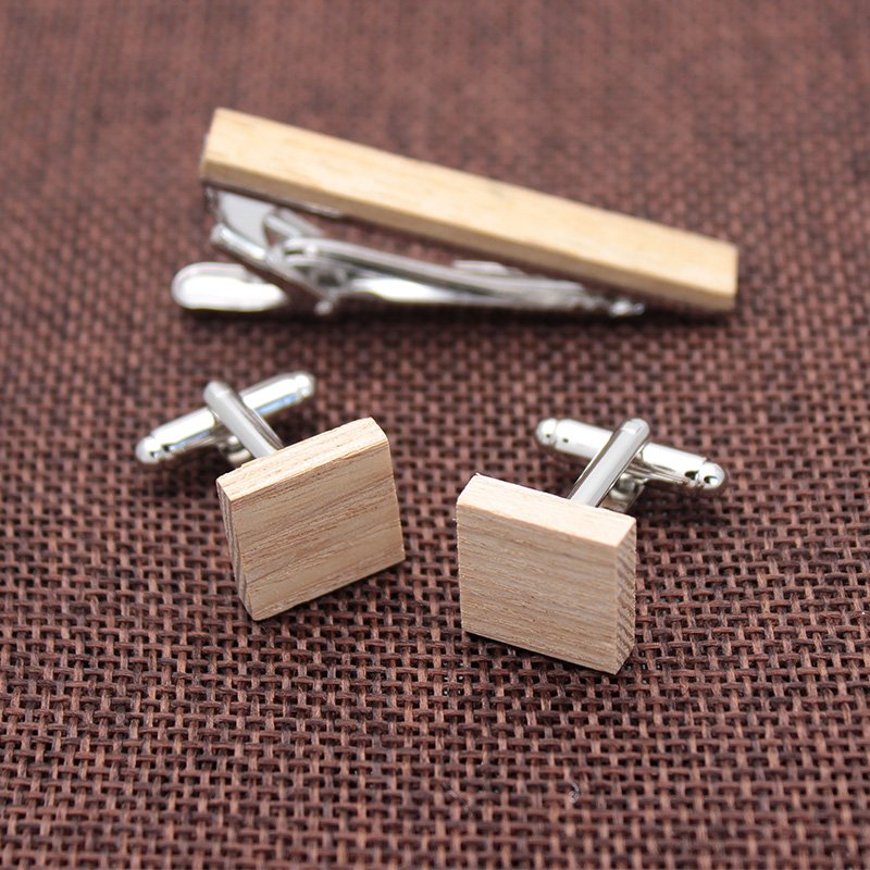 A stylish Wooden Cufflinks and Tie Clip Set featuring stainless steel and wood, elegantly presented in a gift box.