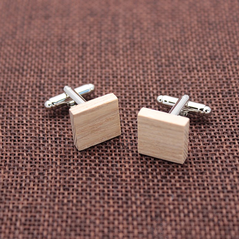 A stylish Wooden Cufflinks and Tie Clip Set featuring stainless steel and wood, elegantly presented in a gift box.