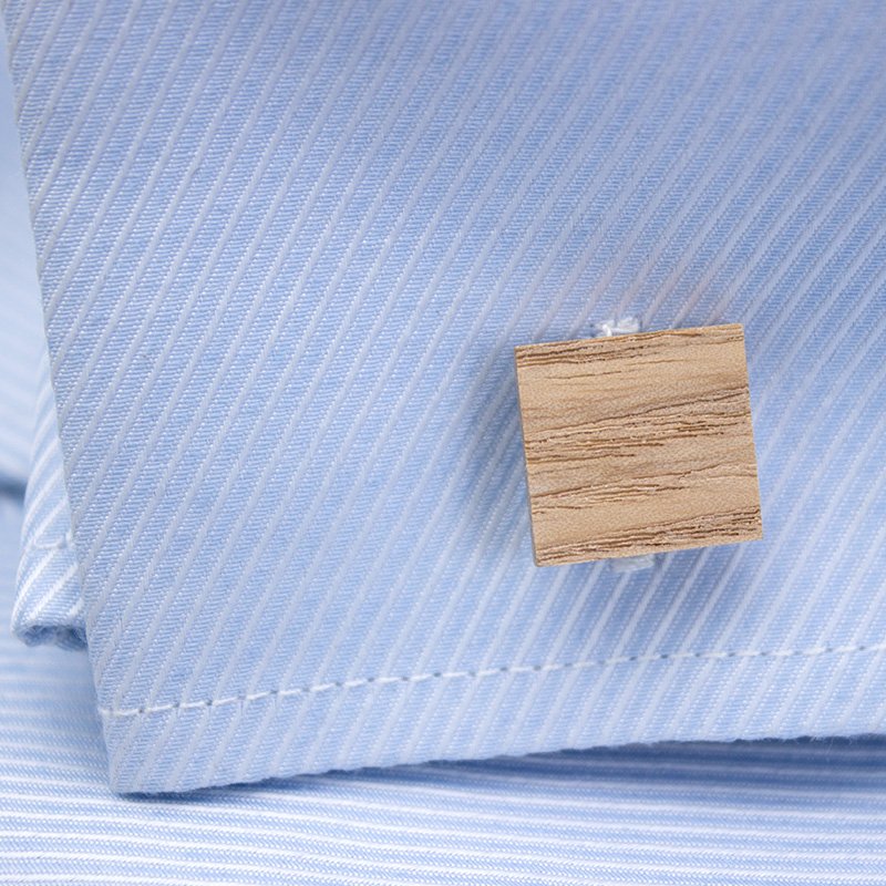 A stylish Wooden Cufflinks and Tie Clip Set featuring stainless steel and wood, elegantly presented in a gift box.