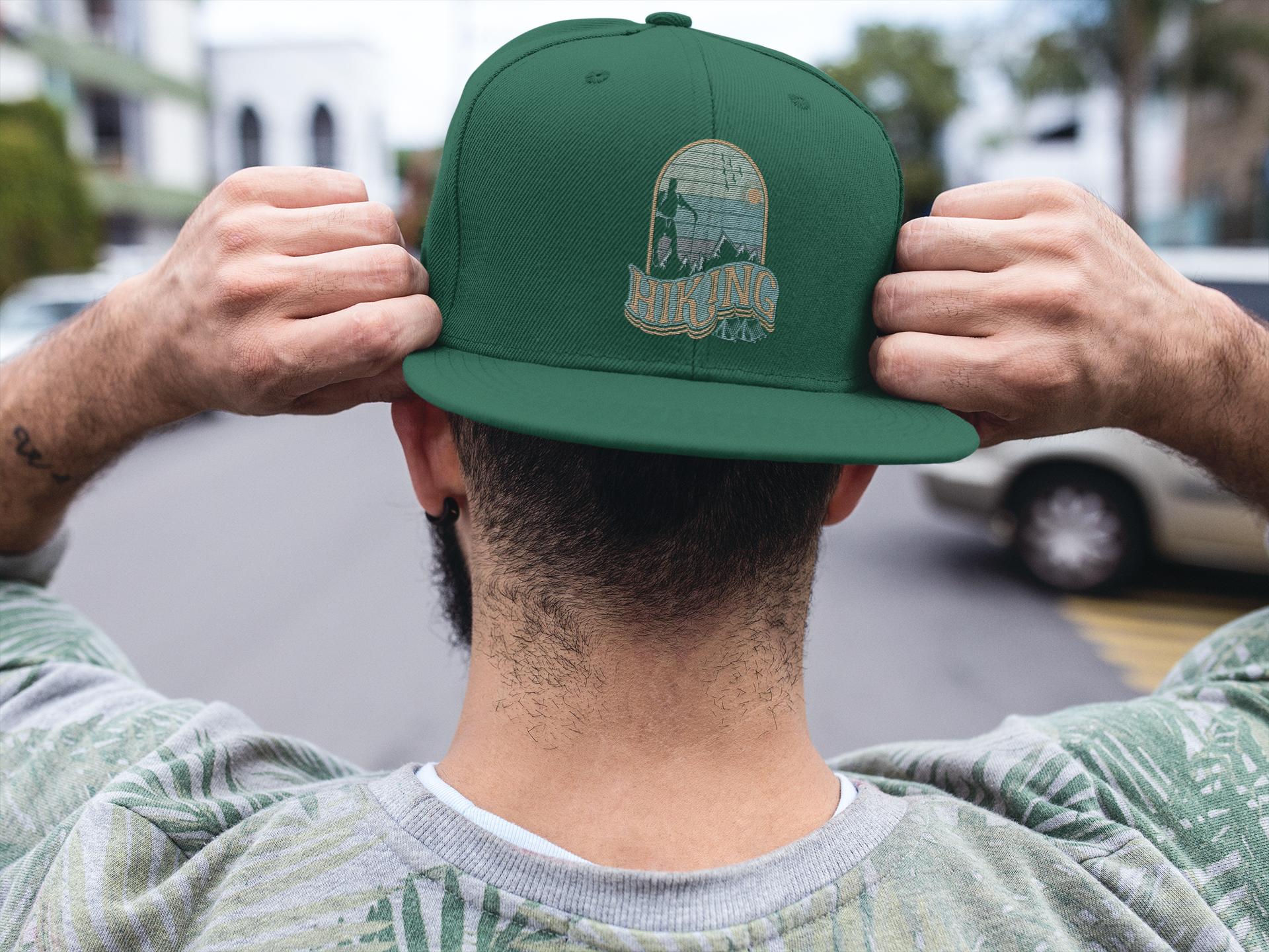 Adventure Is Calling Embroidered Flat Bill Cap featuring a structured design, green under visor, and adjustable snapback closure.