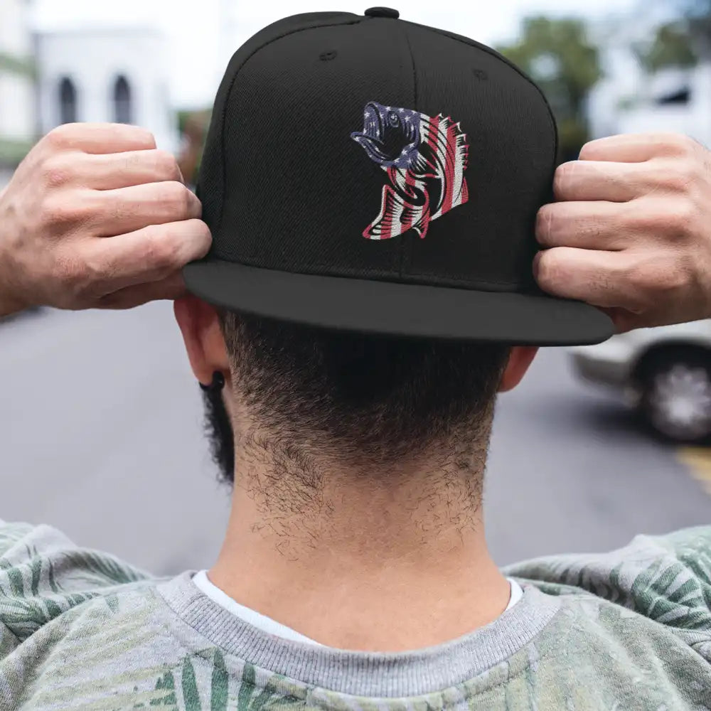 American Flag Fish Embroidered Flat Bill Cap featuring a structured design, green under visor, and snapback closure.