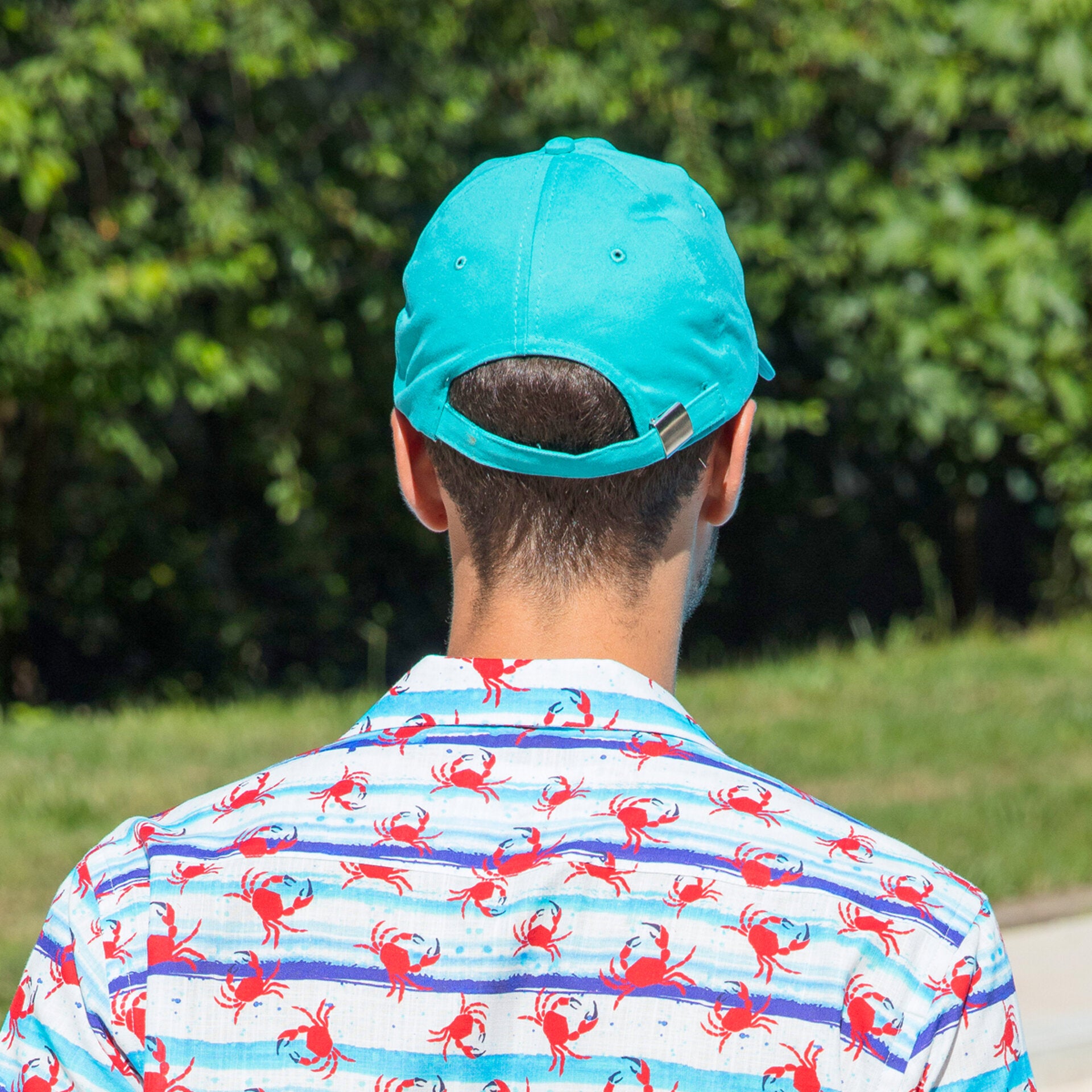 Anemoss Marine Collection Crab Snapback Cap aus 100% Baumwolle mit sportlichem Krebs-Muster und breitem Hutschirm für optimalen Sonnenschutz.