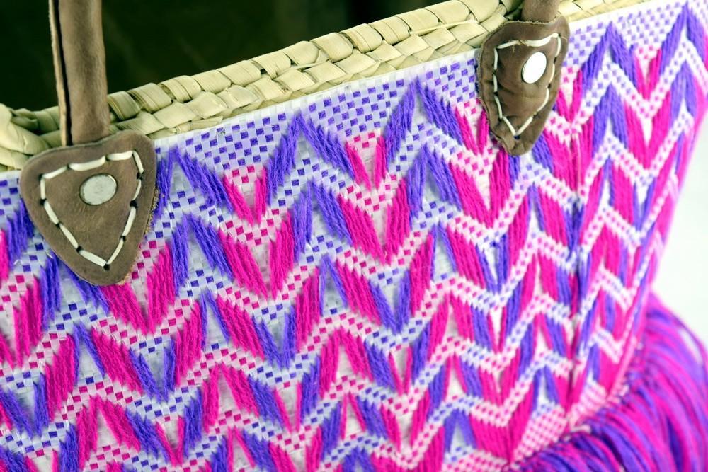 Artisan Purple Fuchsia Fringe Tote featuring vibrant color and stylish fringe details, perfect for casual outings.