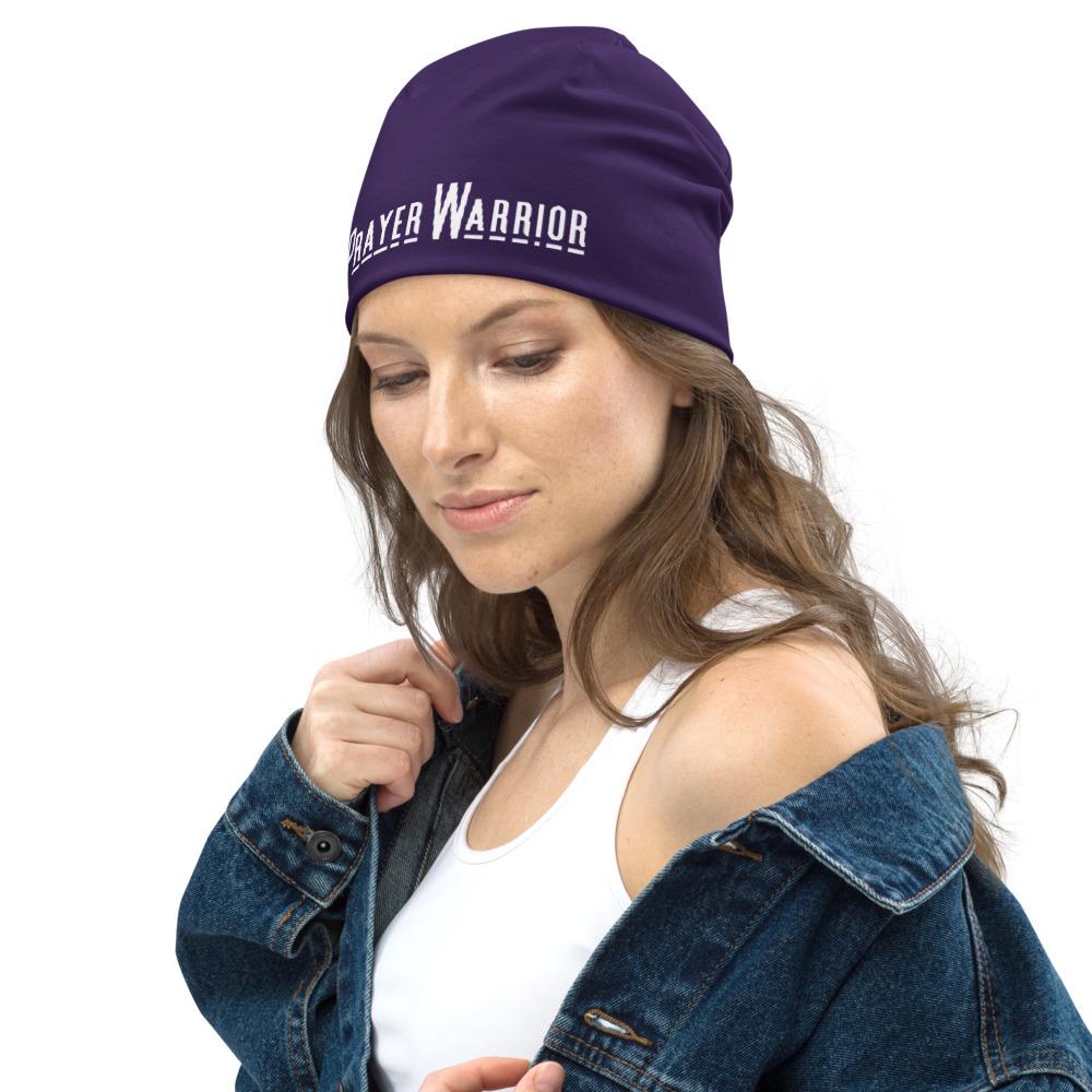 Purple slouchy beanie hat featuring a Prayer Warrior print, designed for both men and women, showcasing a trendy and stylish look.