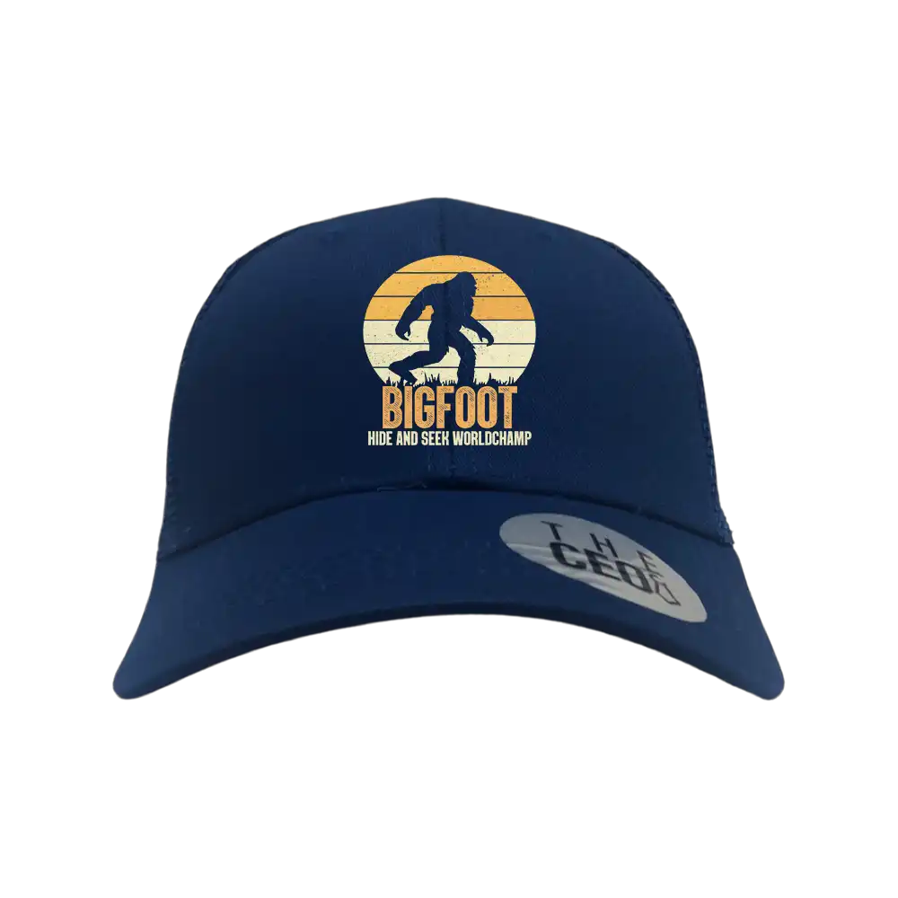 Bigfoot Hide And Seek Embroidered Trucker Hat featuring a unique design, adjustable snapback, and 100% cotton material.