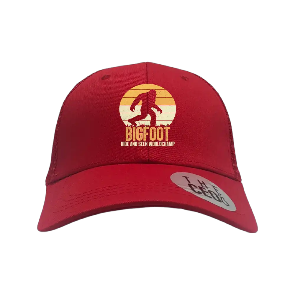 Bigfoot Hide And Seek Embroidered Trucker Hat featuring a unique design, adjustable snapback, and 100% cotton material.