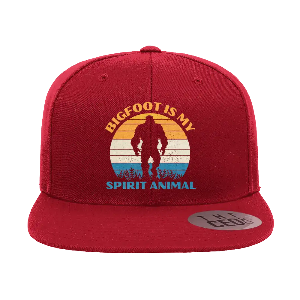 Bigfoot Is My Spirit Animal Embroidered Flat Bill Cap featuring a structured design and green under visor.