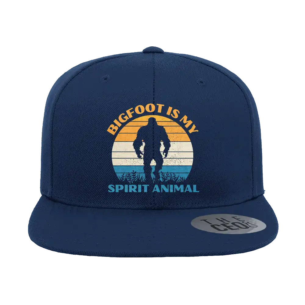 Bigfoot Is My Spirit Animal Embroidered Flat Bill Cap featuring a structured design and green under visor.