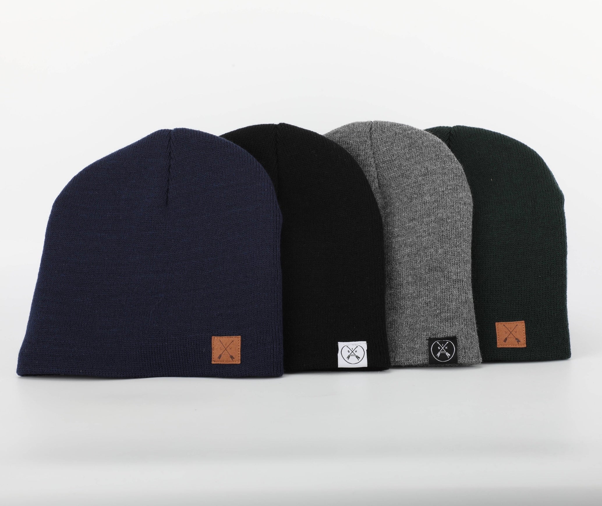 Black Arrow Beanie designed for winter adventures, featuring moisture-wicking and quick-drying materials.