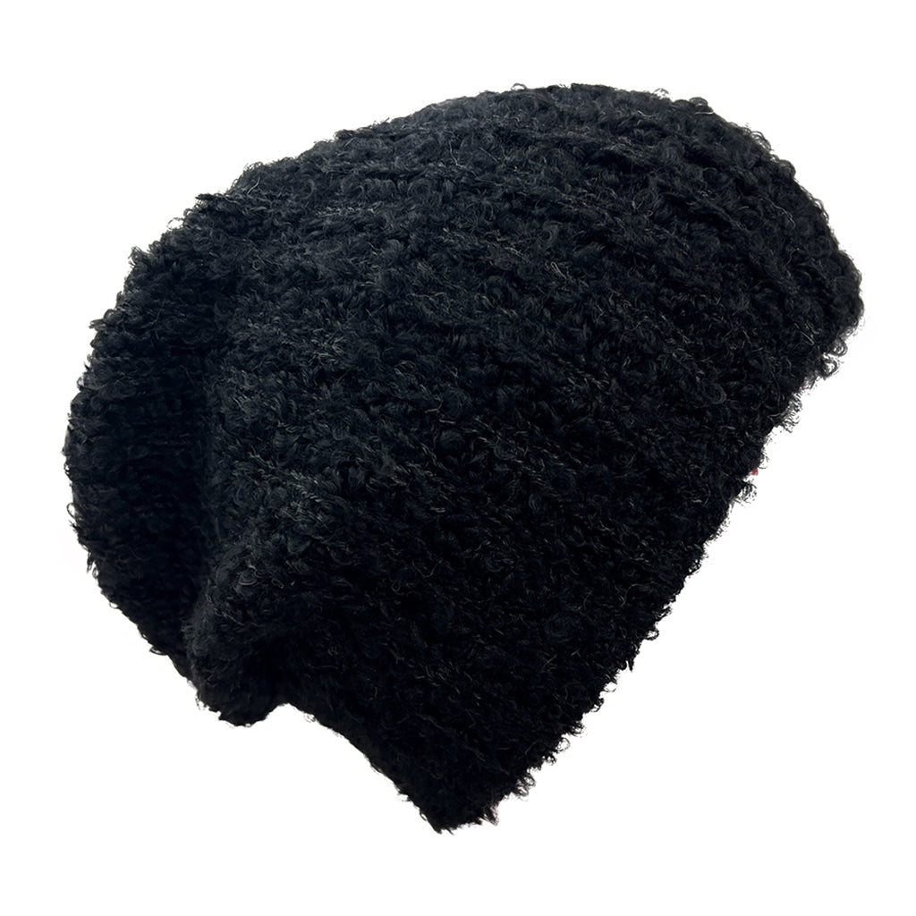 Black Loop Knit Alpaca Beanie showcasing a soft ribbed texture, perfect for winter wear, handmade in Peru.