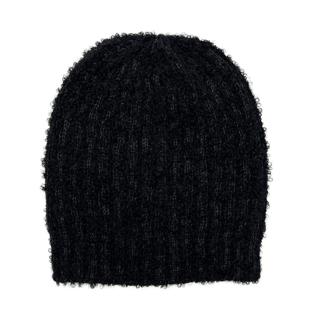 Black Loop Knit Alpaca Beanie showcasing a soft ribbed texture, perfect for winter wear, handmade in Peru.