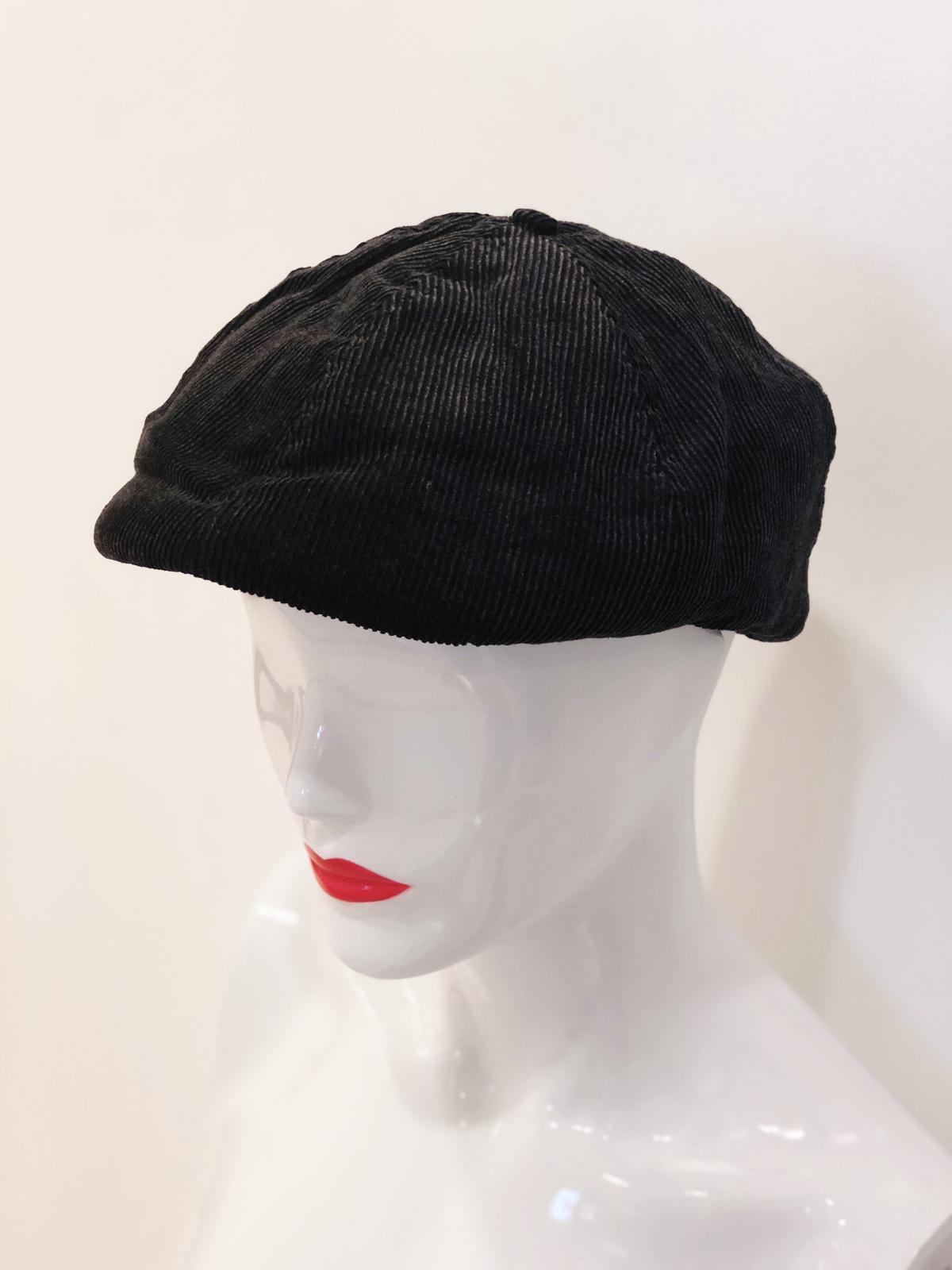 A stylish 'Blaze' Black Soft Beret made from soft fabric, perfect for adding elegance to any outfit.