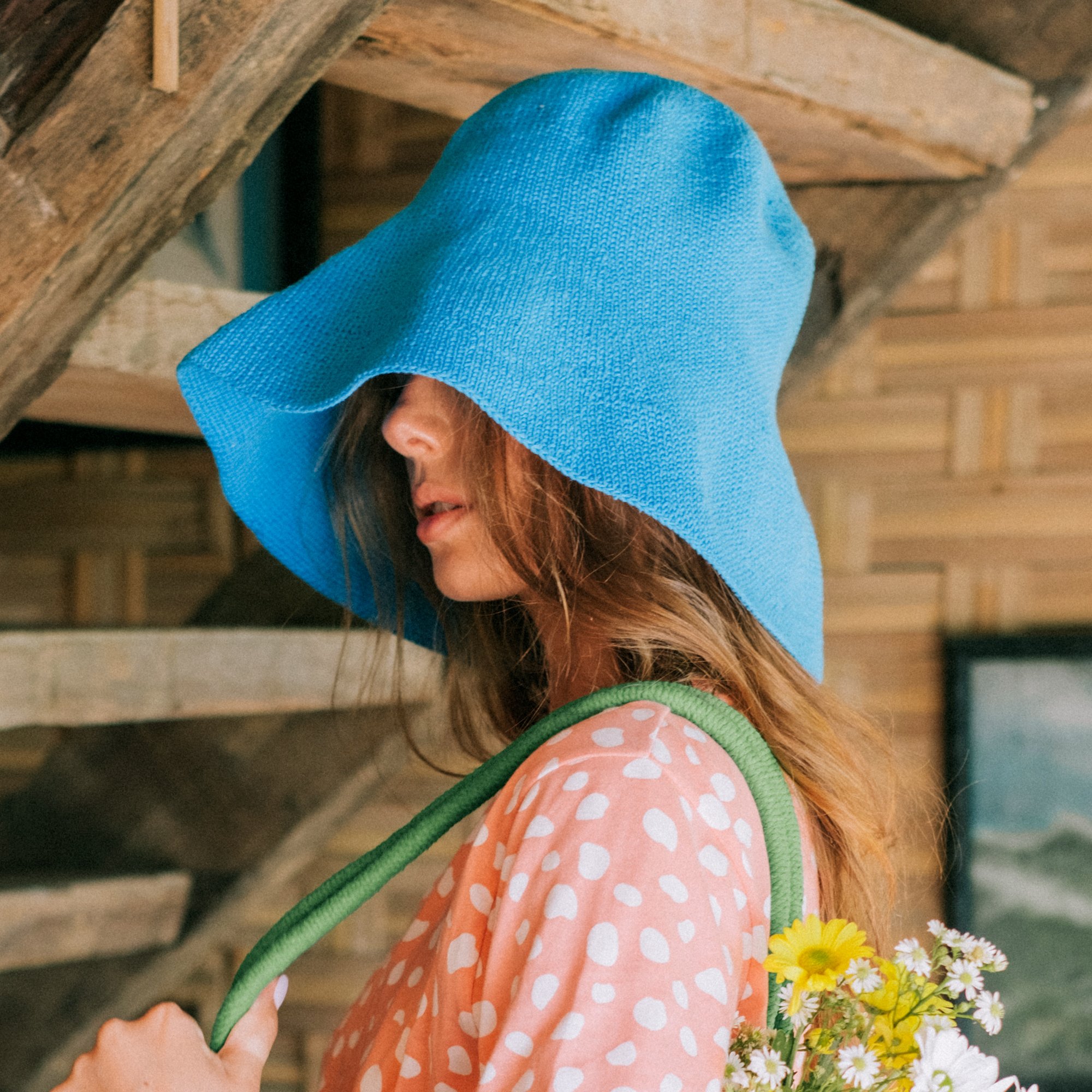 BLOOM Crochet Hat in Mosaic Blue, featuring a soft crochet design inspired by Calla Lily shape, perfect for outdoor activities.