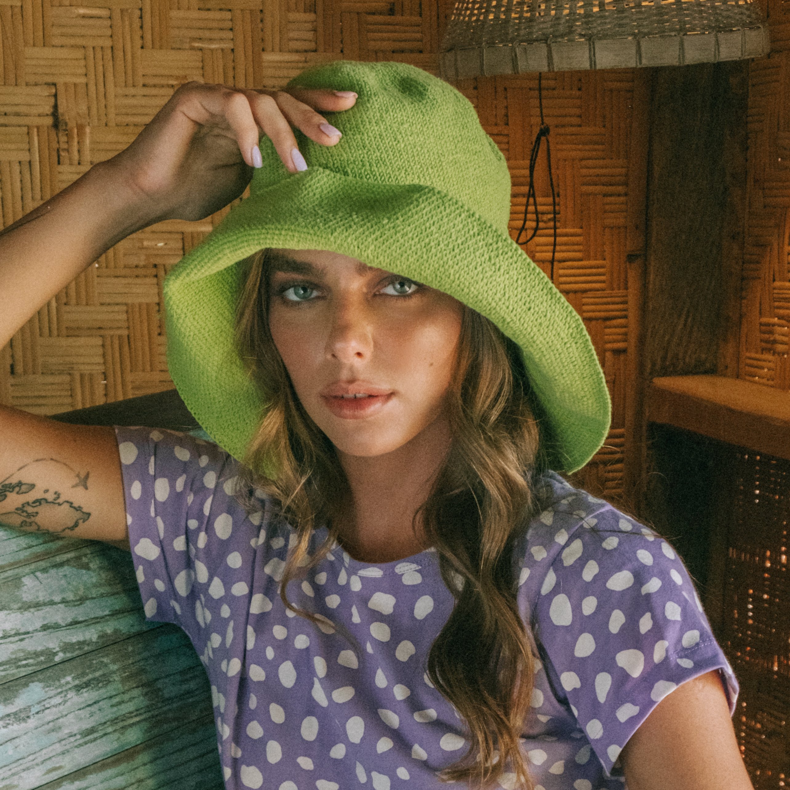 BLOOM Crochet Sun Hat in vibrant lime green, featuring a soft, shapeable design inspired by Calla Lily flowers, perfect for summer outings.