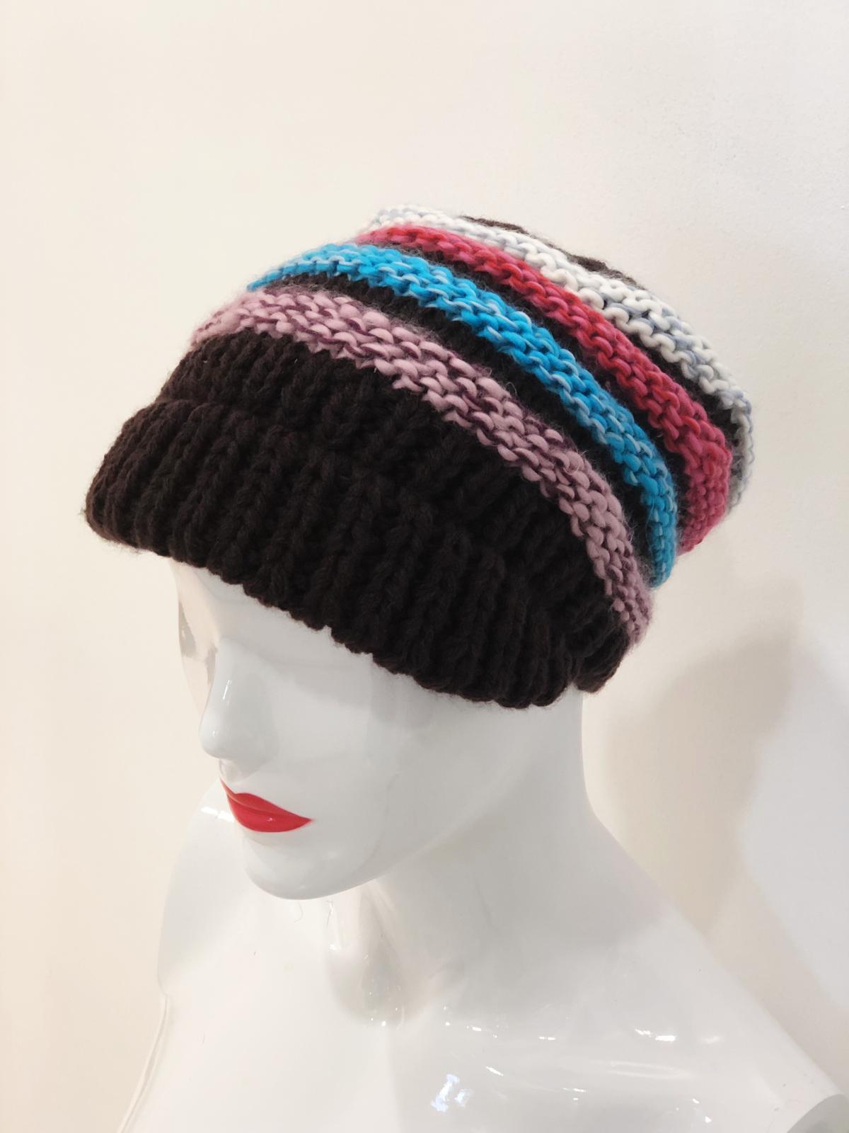 A vibrant multi-color beanie named 'Cameron', showcasing a blend of colors perfect for winter fashion.