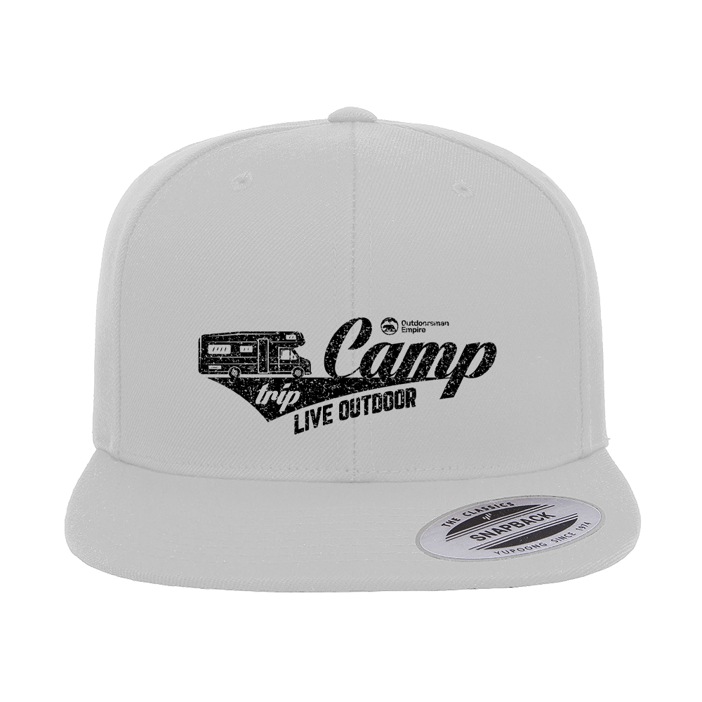 Camp Trip Embroidered Flat Bill Cap featuring a structured design, green under visor, and adjustable snapback closure.