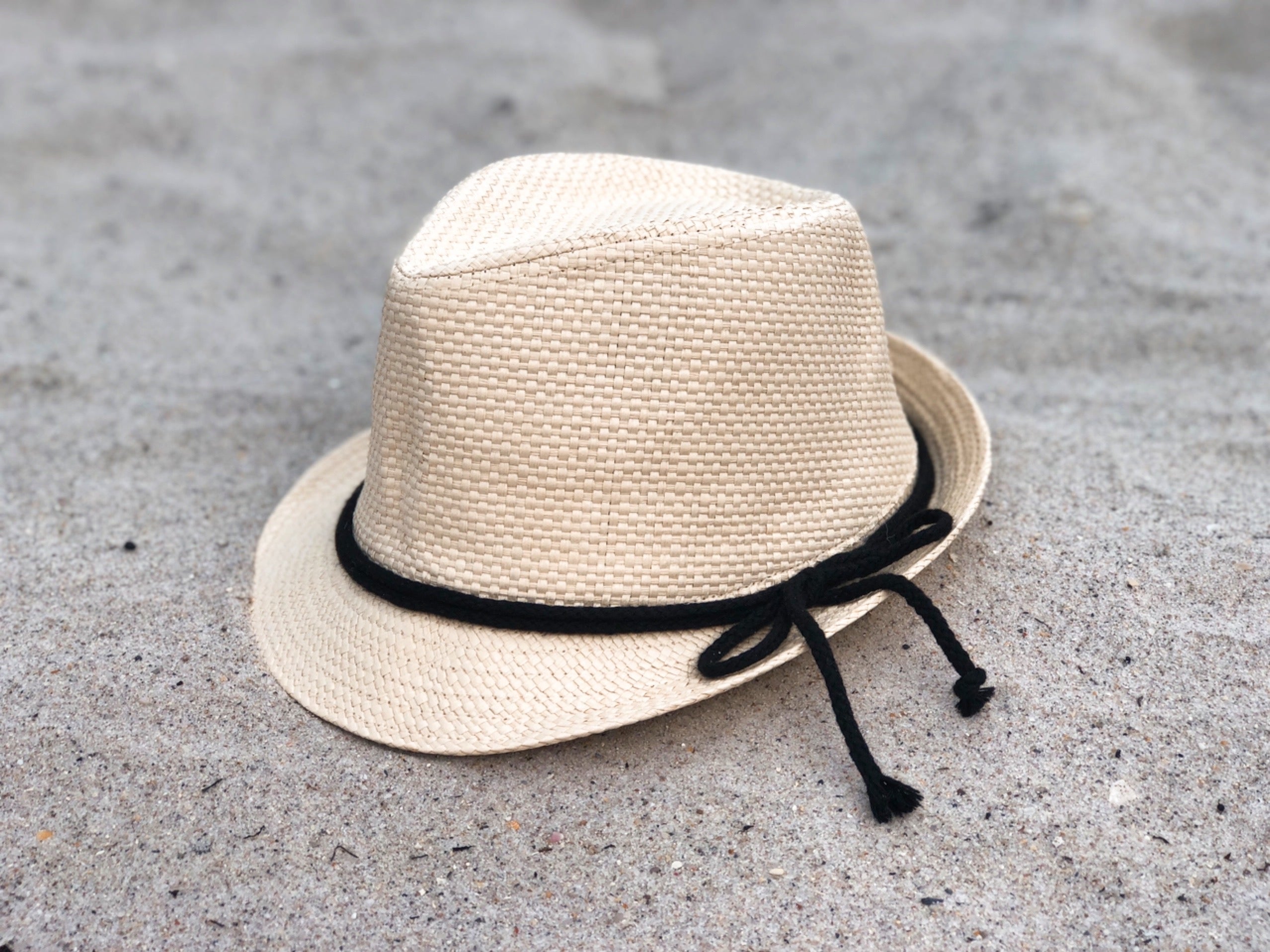 Feeling SunShine Fedora Hat made of Toyo straw with a braid cord trim and a 2-inch brim, featuring an elastic sweat band for comfort.