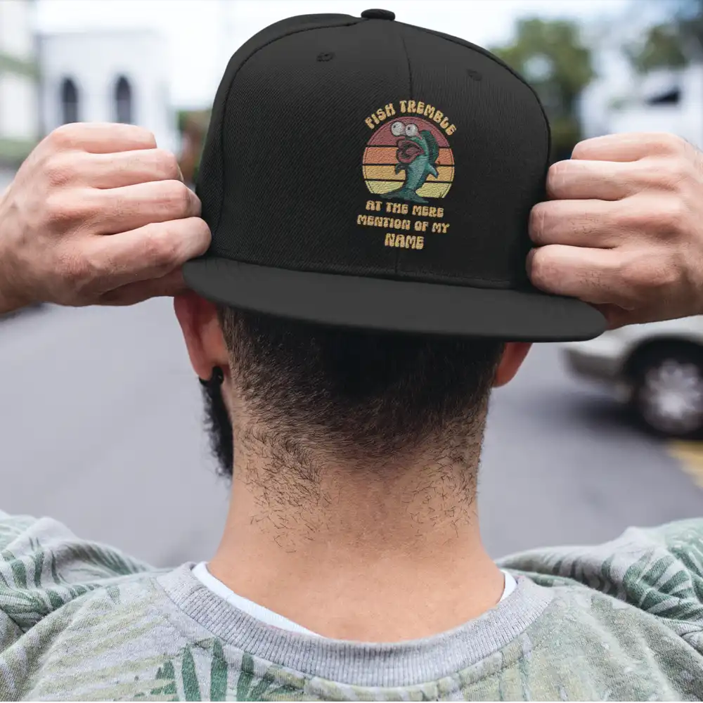 Fish Tremble Printed Flat Bill Cap featuring a structured design and vibrant print, made from 100% cotton twill.