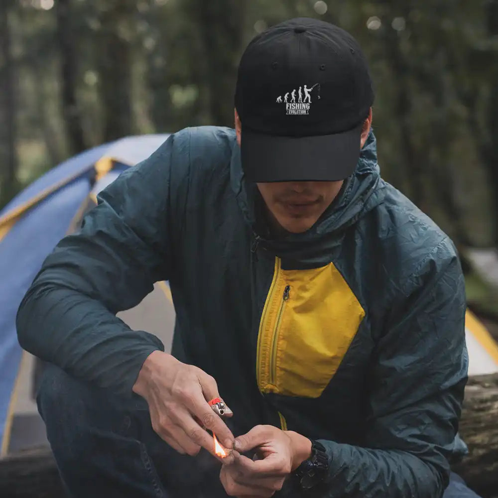 Fishing Evolution Embroidered Baseball Hat showcasing a unique fishing design with a snapback closure, made from 100% cotton.