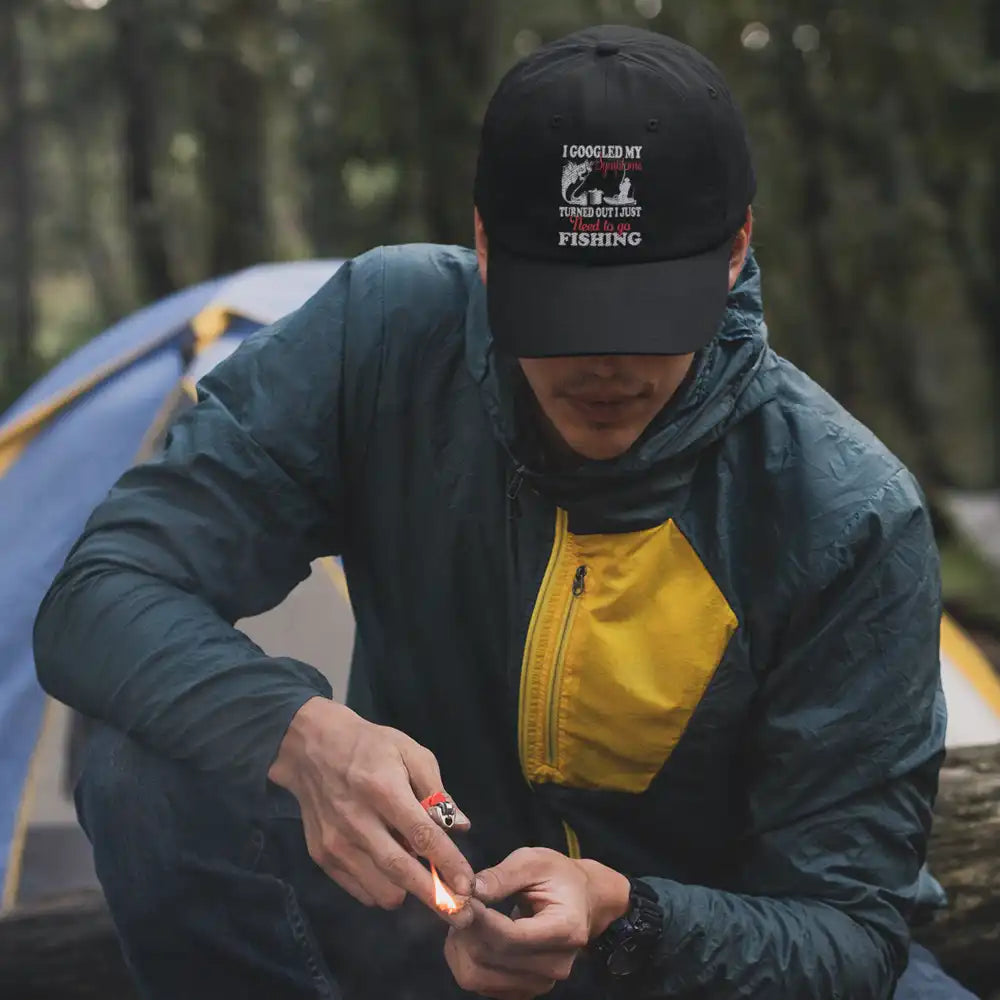 Fishing Symptoms Embroidered Baseball Hat featuring a unique fishing design, made from 100% cotton with a snapback closure.