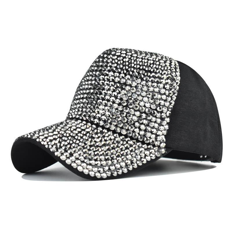 A stylish women's baseball cap featuring a diamond design, made of cotton with a curved brim and adjustable strap.