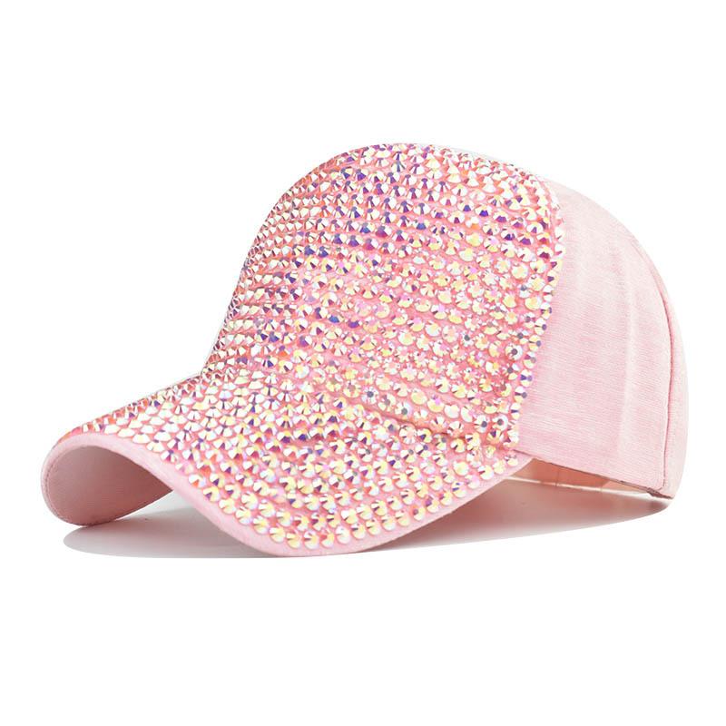 A stylish women's baseball cap featuring a diamond design, made of cotton with a curved brim and adjustable strap.