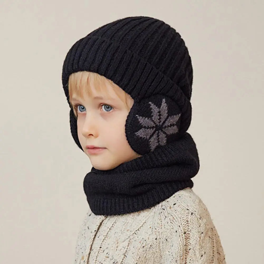 A cozy girls hat and scarf set in stylish design, made from thick acrylic material, perfect for winter wear.