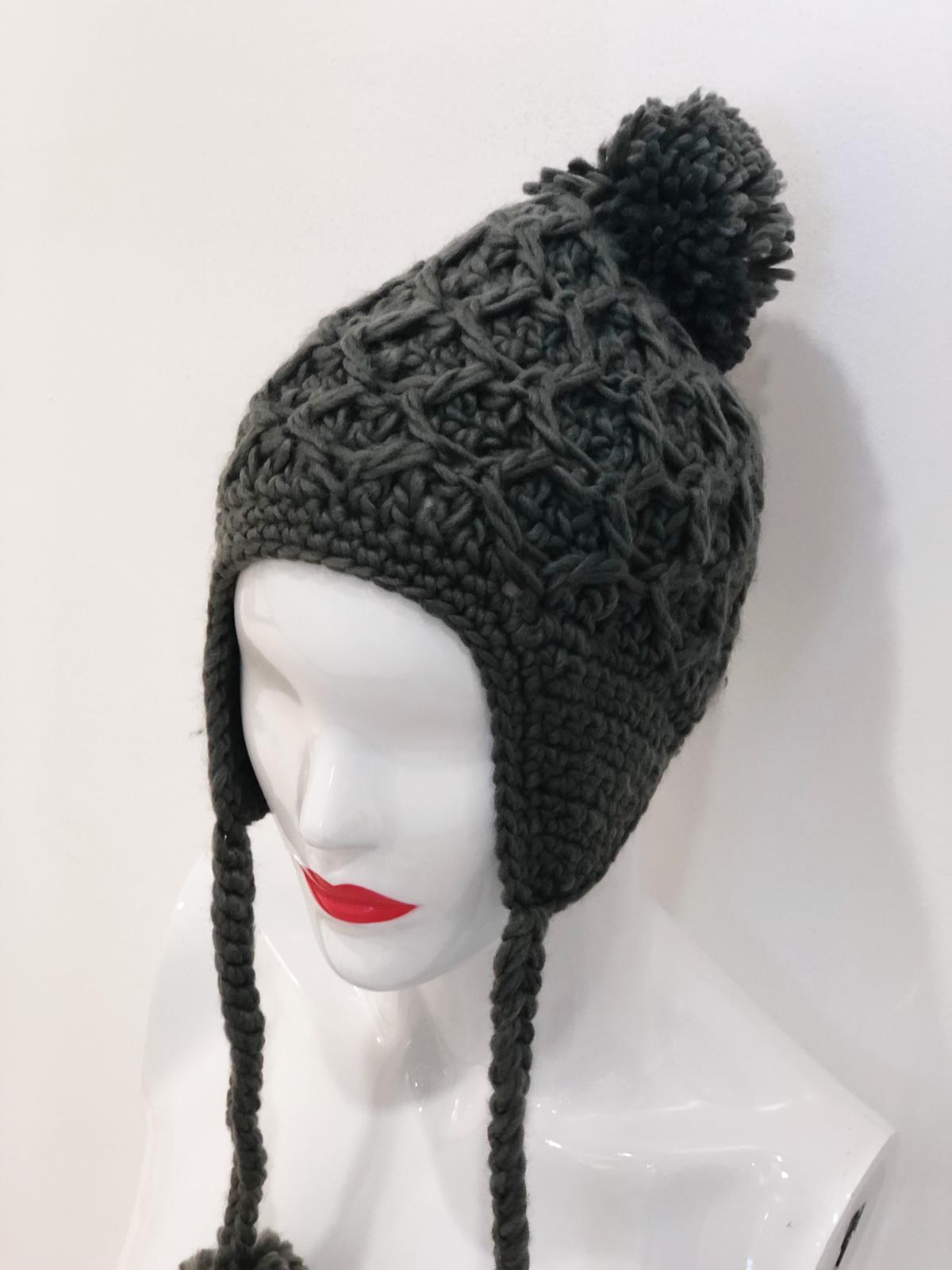 Gray 'Avery' Pom Pom Beanie with a stylish design and soft knit material, featuring a playful pom pom on top.