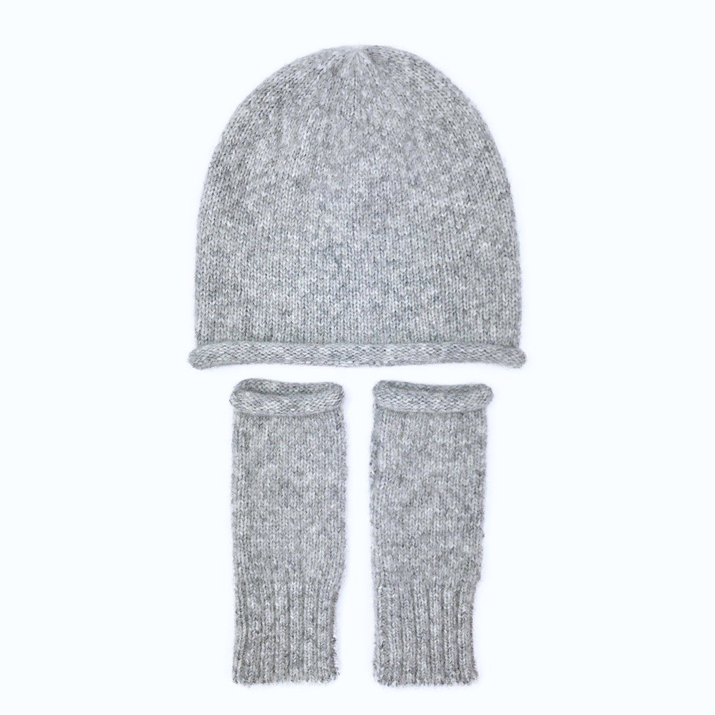 Gray Essential Knit Alpaca Beanie, handmade in Peru, showcasing its soft texture and slouchy design.