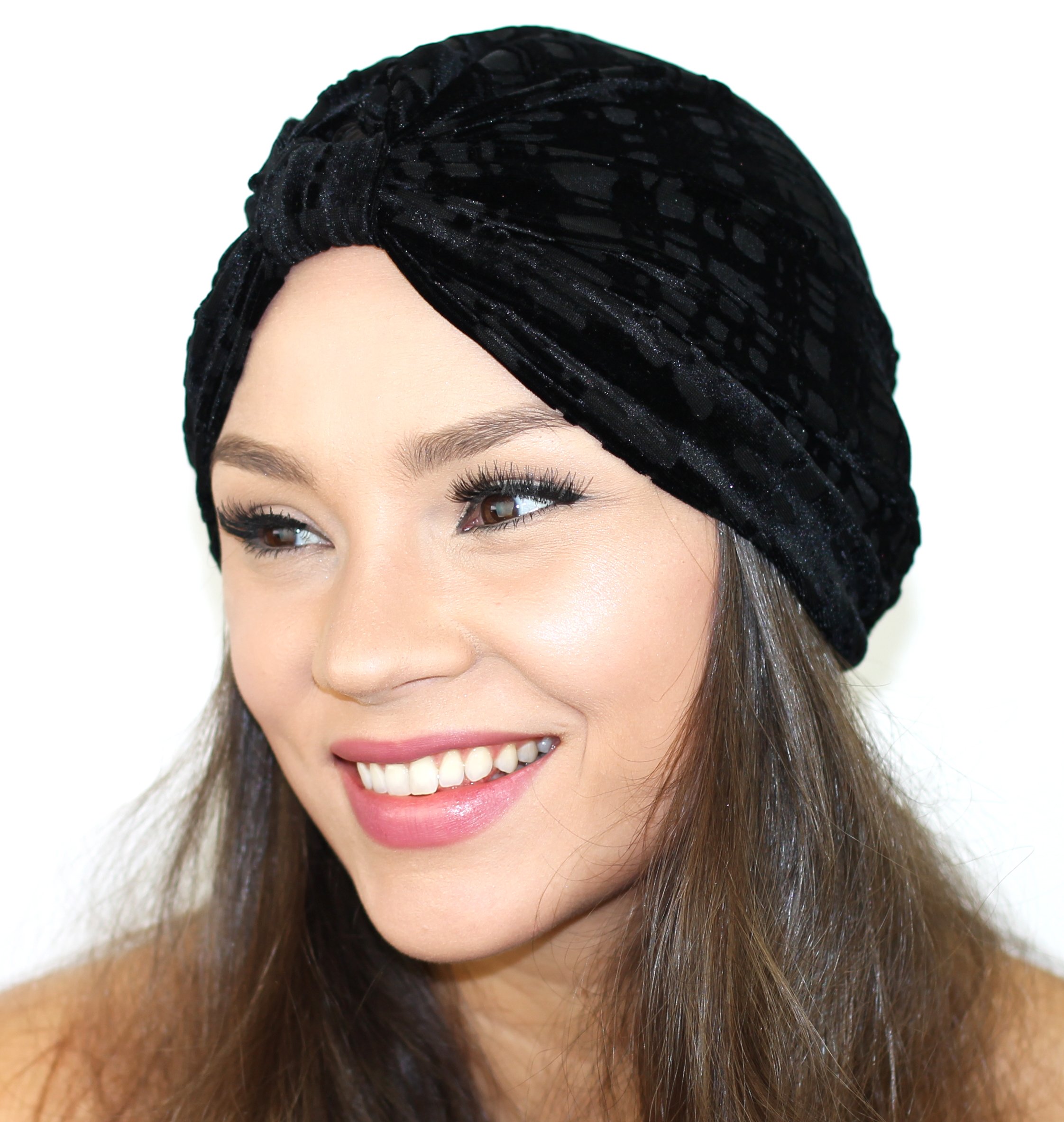 A stylish Gridiron Burnout Turban made of lightweight stretch velvet, available in Berry, Navy, and Black colors, showcasing its plush texture and cinched back design.