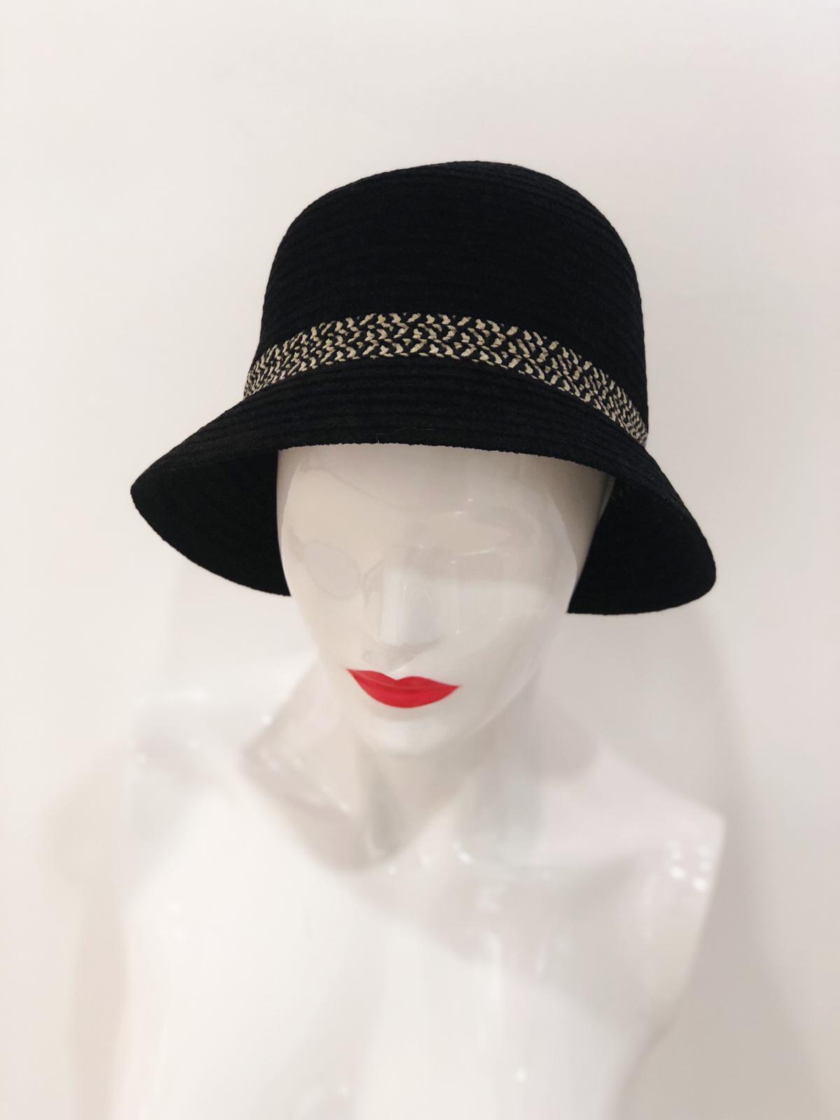 A stylish 'Haven' Black Bucket Hat displayed on a neutral background, showcasing its trendy design and comfortable fit.