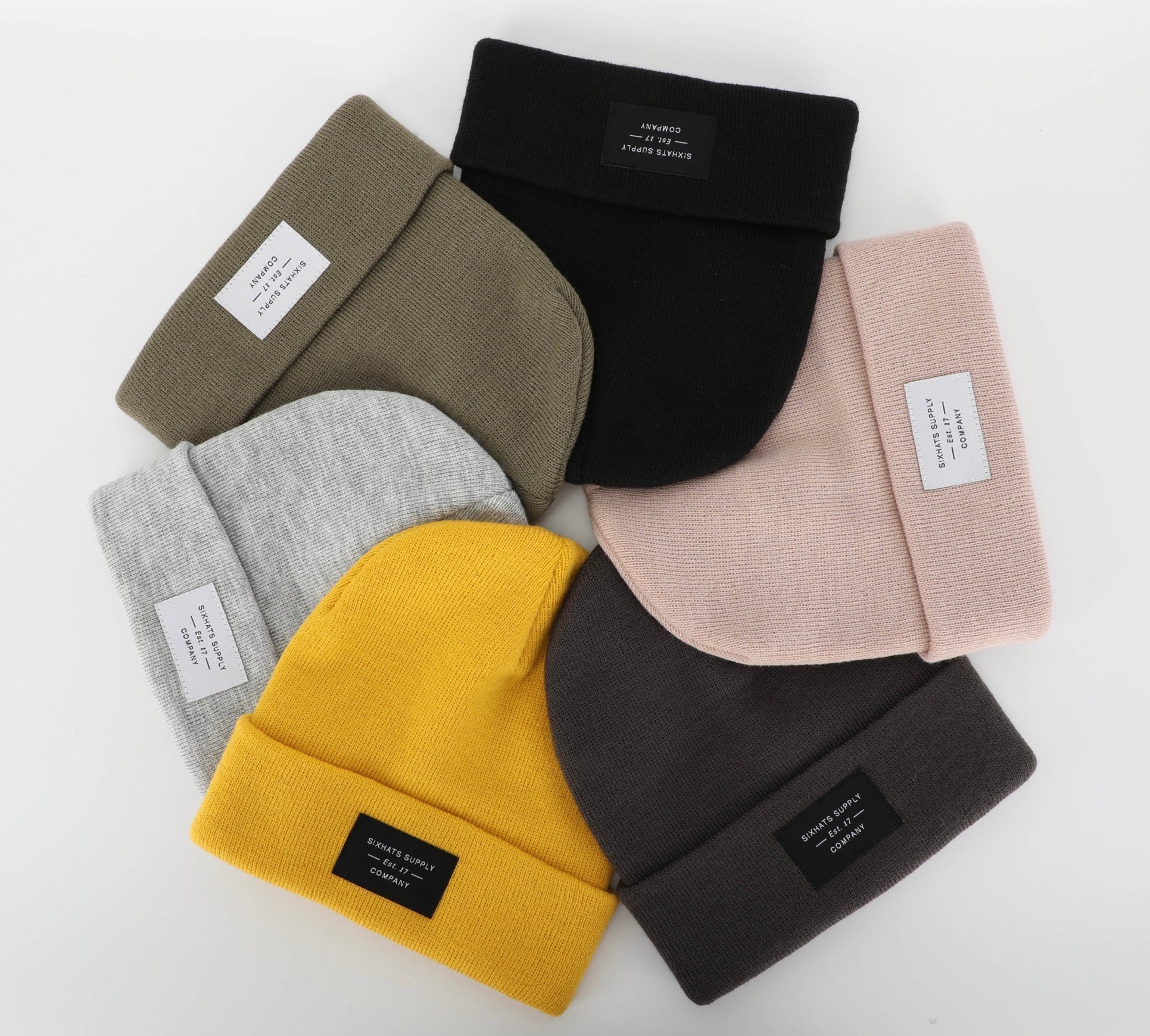 Heather Grey Folding Beanie displayed on a neutral background, showcasing its soft texture and stylish design.