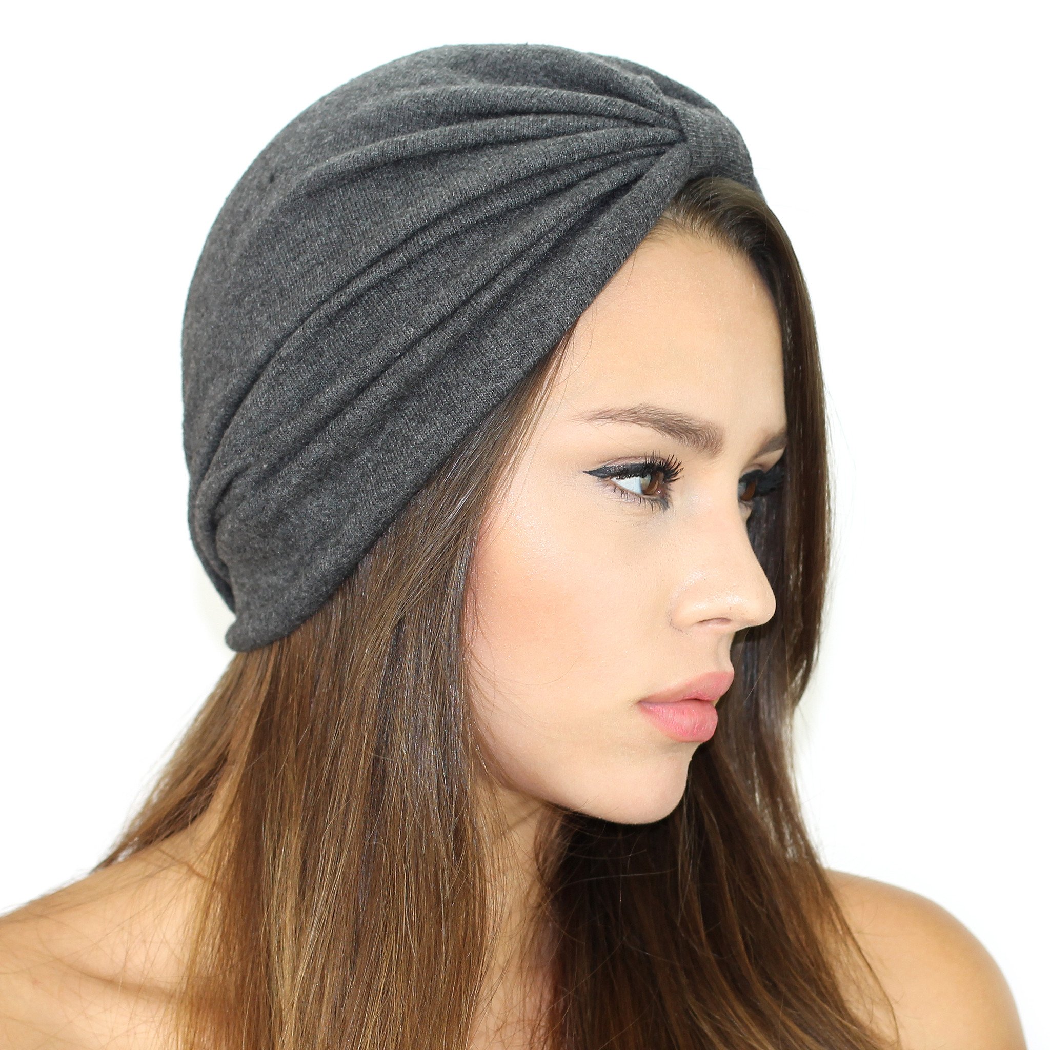 A stylish Jersey Knit Turban made from ultra-soft stretch jersey fabric, featuring a cinched back for a snug fit, perfect for cooler weather.