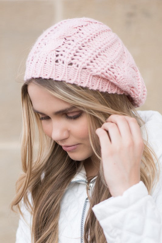 A cozy Knit Slouchy Beret made from super soft acrylic, featuring a stylish knitted design suitable for teens and adults.