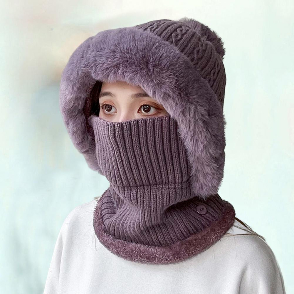 A cozy knitted hat with pompom plush ears, designed for women, in solid color, perfect for autumn and winter outdoor activities.