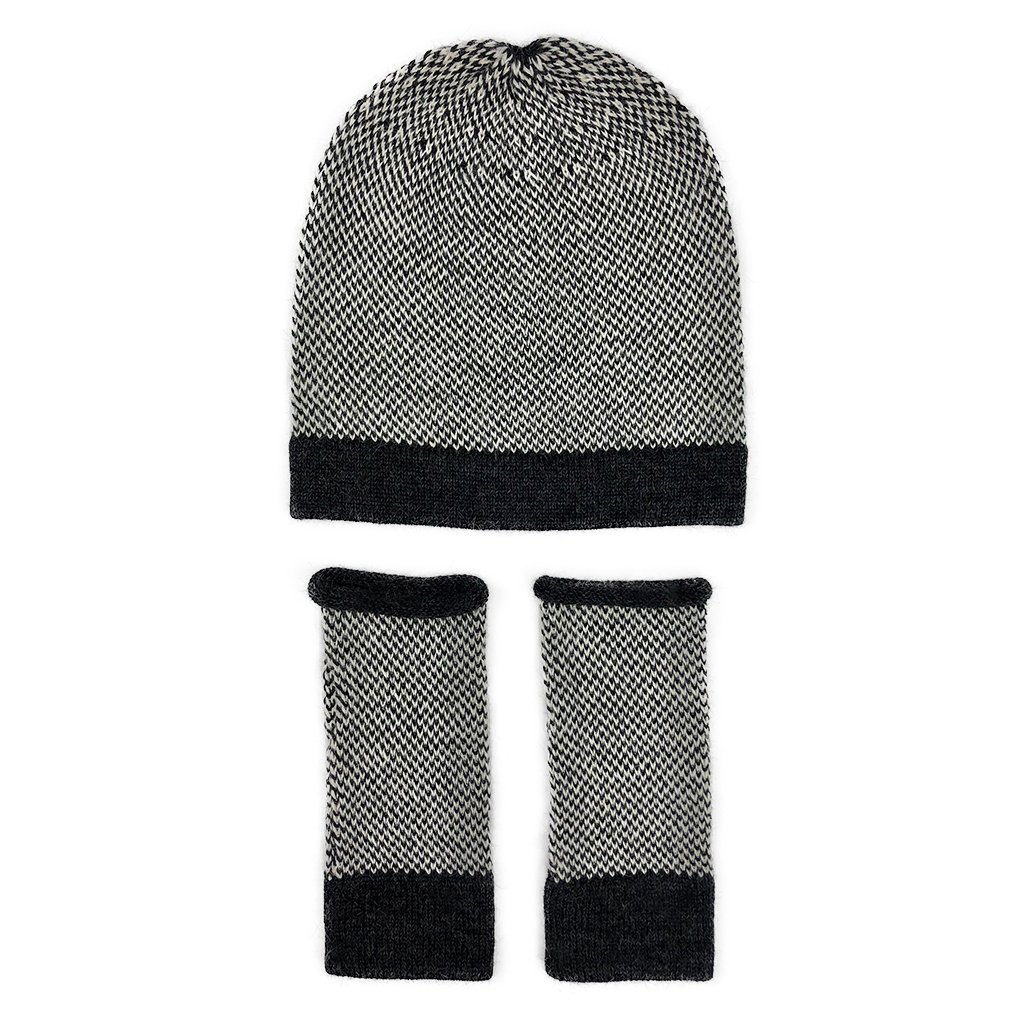 Midnight Interwoven Alpaca Beanie featuring a textured black and white design, showcasing its luxurious alpaca fiber and slouchy style.