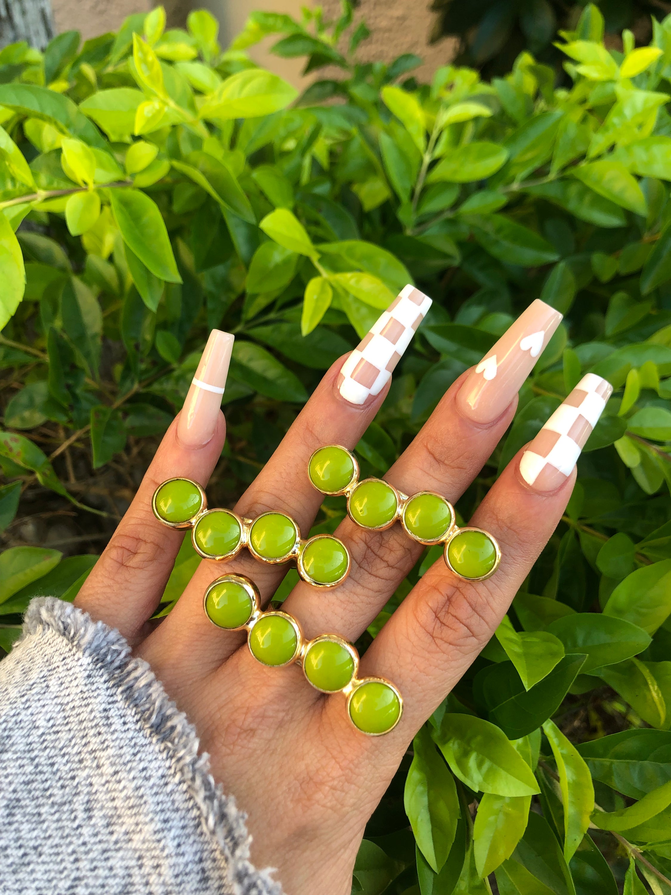 A beautiful Natural Stone Multi-Finger Ring featuring gold plating and adjustable design, showcasing unique natural stones.