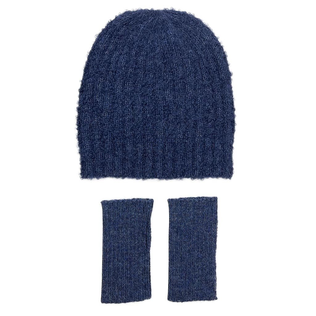 Navy Loop Knit Alpaca Beanie showcasing a slouchy design with subtle ribbed stripes, made from soft alpaca fiber.