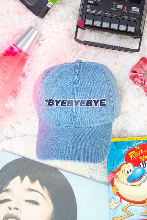 Denim cap with "BYEBYEBYE" text.