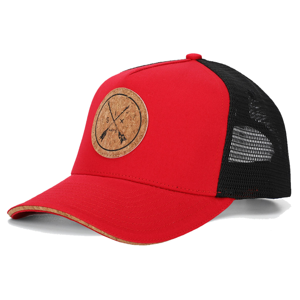 Red and black snapback hat with cork brim and mesh back, featuring a round recycled cork patch.