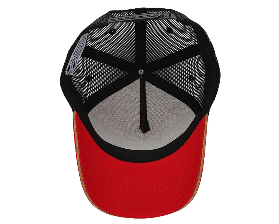 Red and black snapback hat with cork brim and mesh back, featuring a round recycled cork patch.