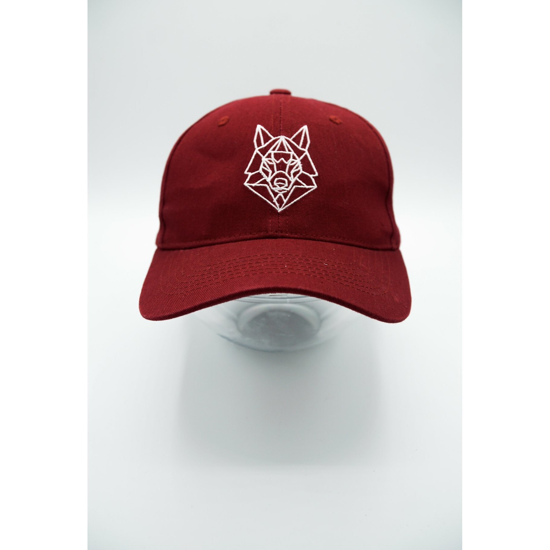 Red TWL Pitcher Cap made of 100% cotton with adjustable strap and white TWL Wolfe logo embroidery on the front.