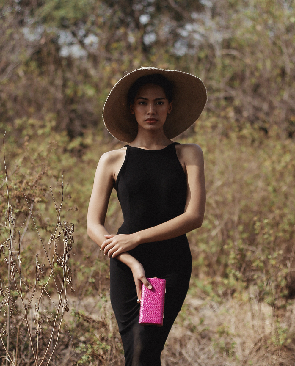 RIRI Jute Handwoven Straw Hat in Natural Beige with a wide brim, showcasing its eco-friendly jute material and comfortable cotton inner strap.