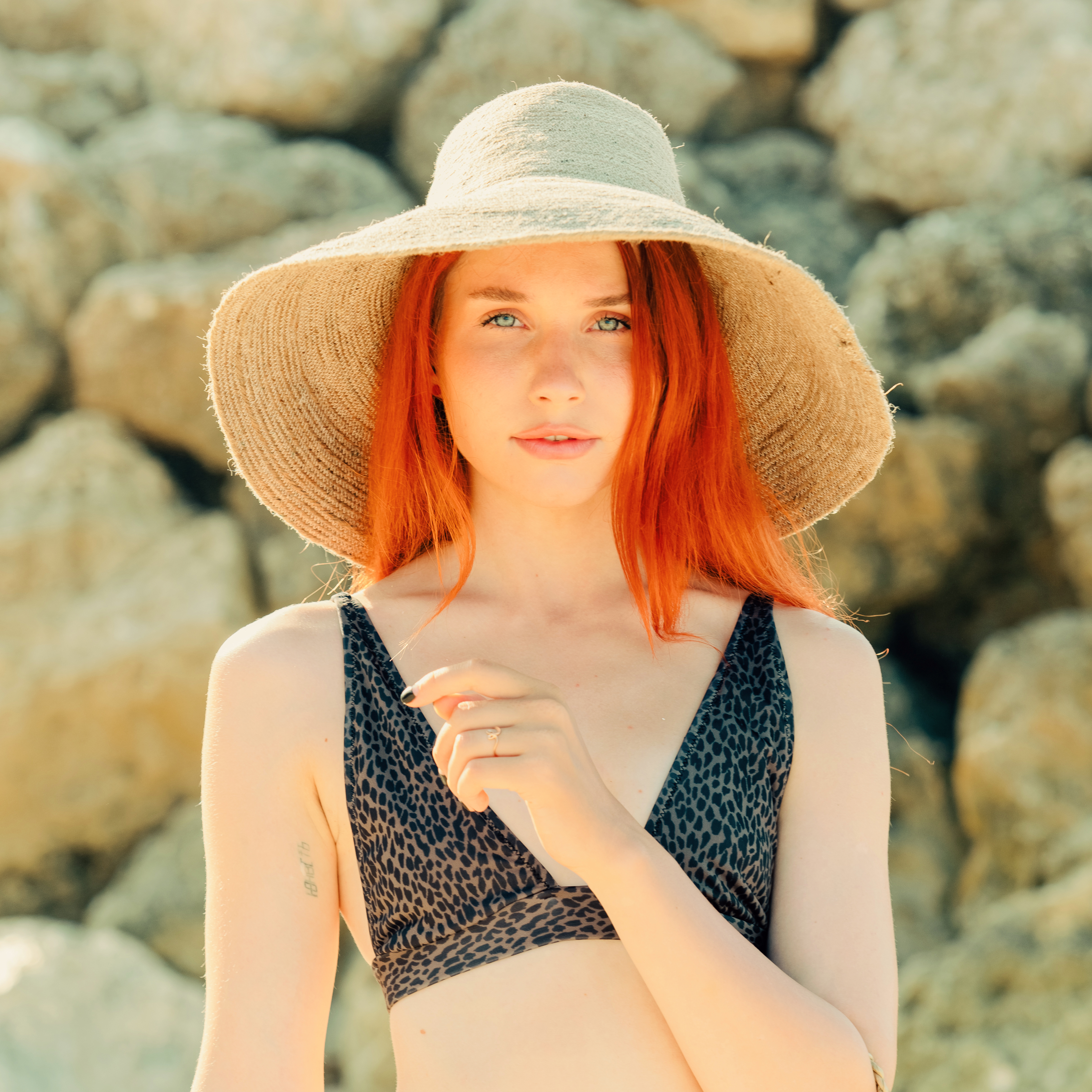 RIRI Jute Handwoven Straw Hat in Natural Beige with a wide brim, showcasing its eco-friendly jute material and comfortable cotton inner strap.