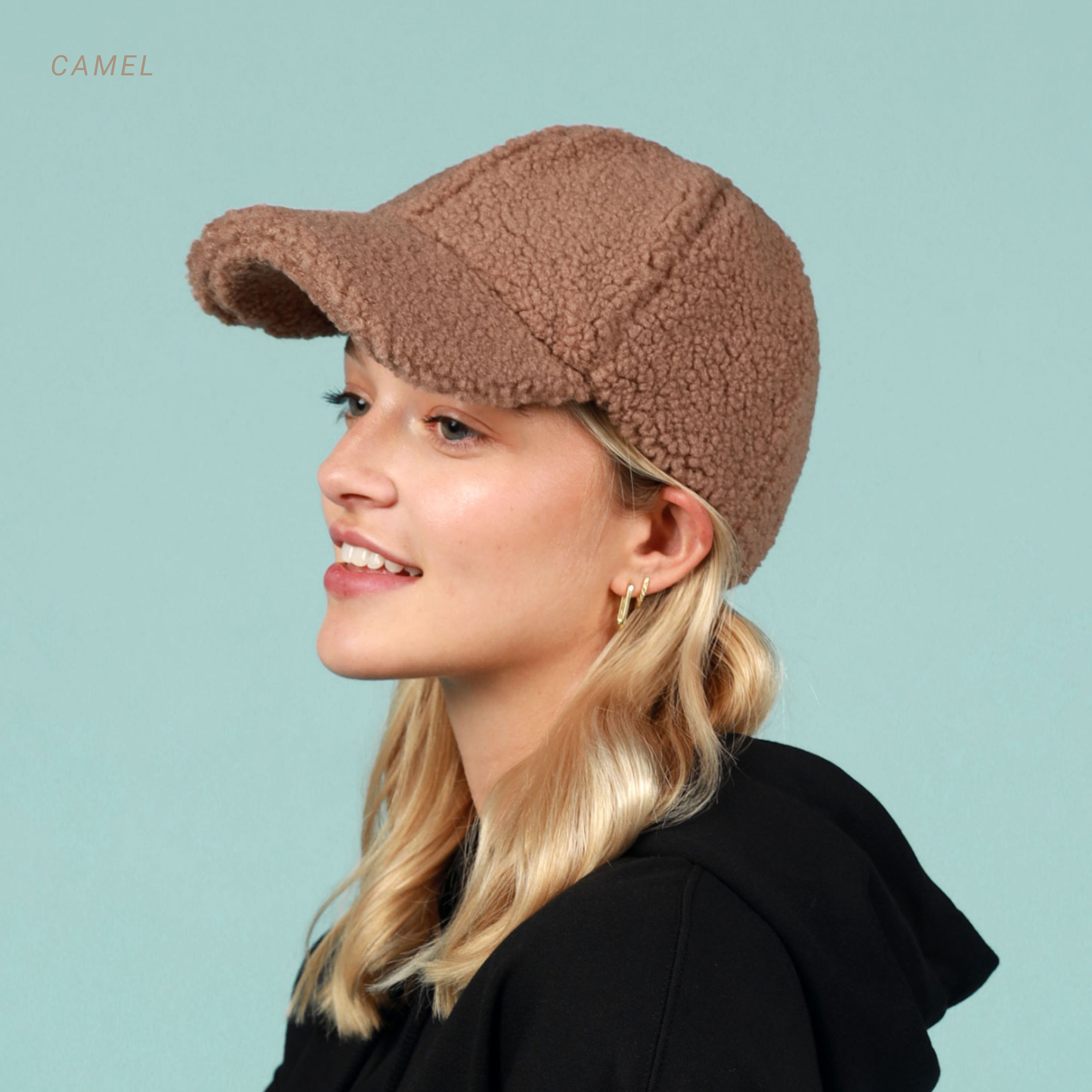 Sherpa Baseball Cap made from soft teddy-like material, featuring a moldable front bill and hook and loop closure.