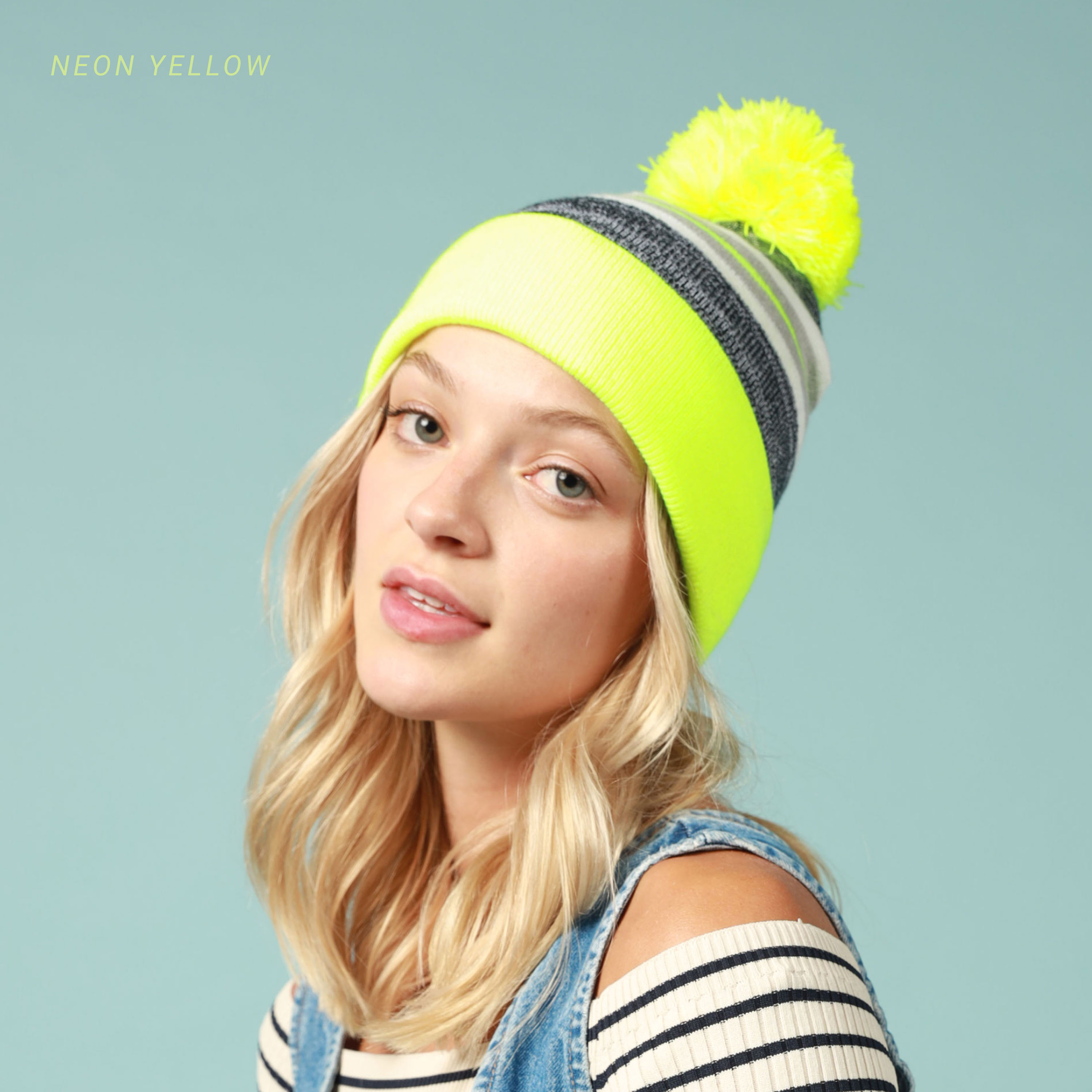 Stripe Sport Pom Beanie featuring a stylish stripe design and adjustable fit, perfect for outdoor activities.