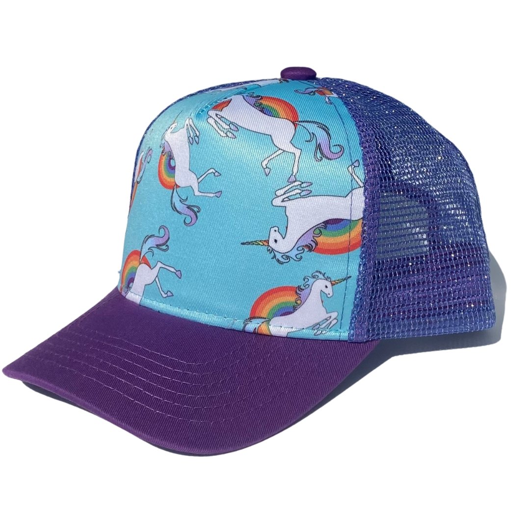 Unicorn Sparkle Trucker Hat with teal background, sparkly purple mesh, and dark purple visor, featuring a whimsical unicorn print.